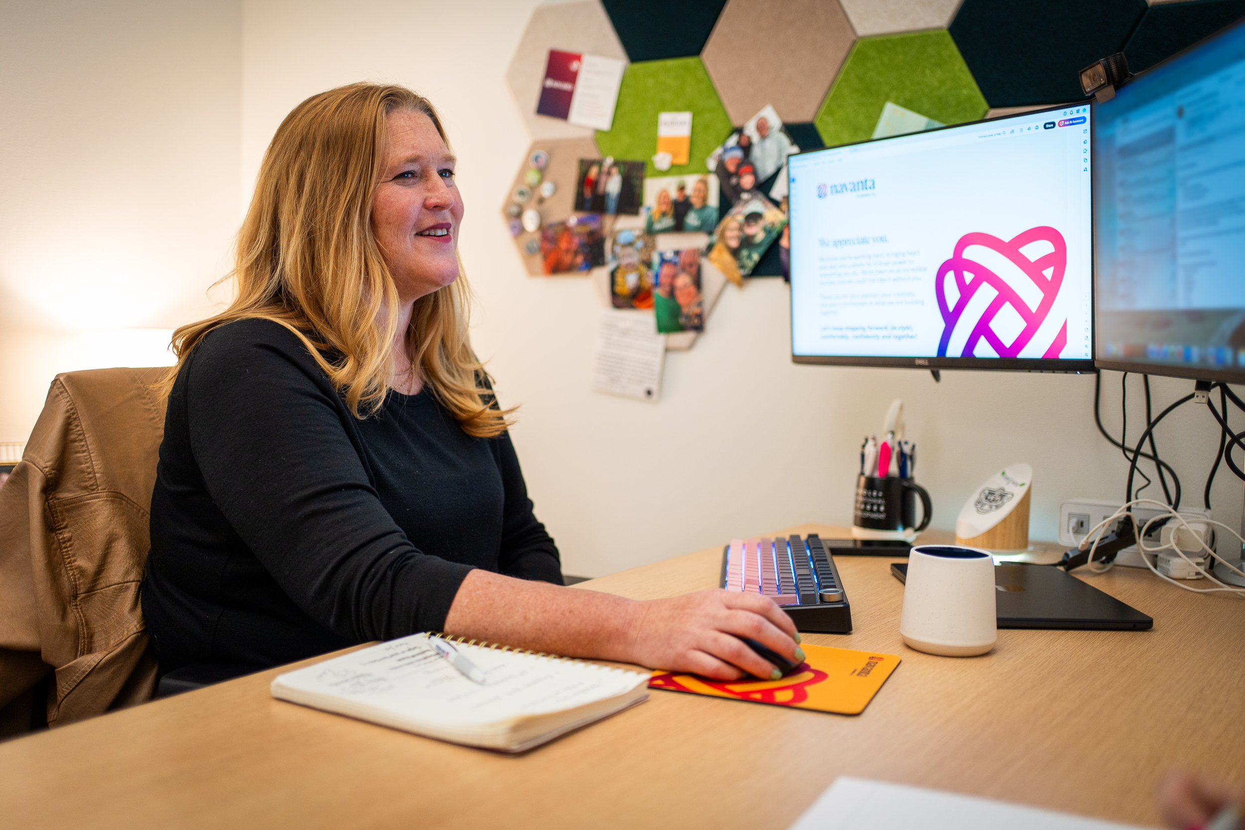 Smiling woman at her computer